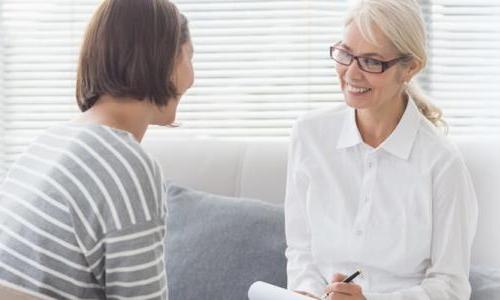 Mental health nurse and patient having a therapy session